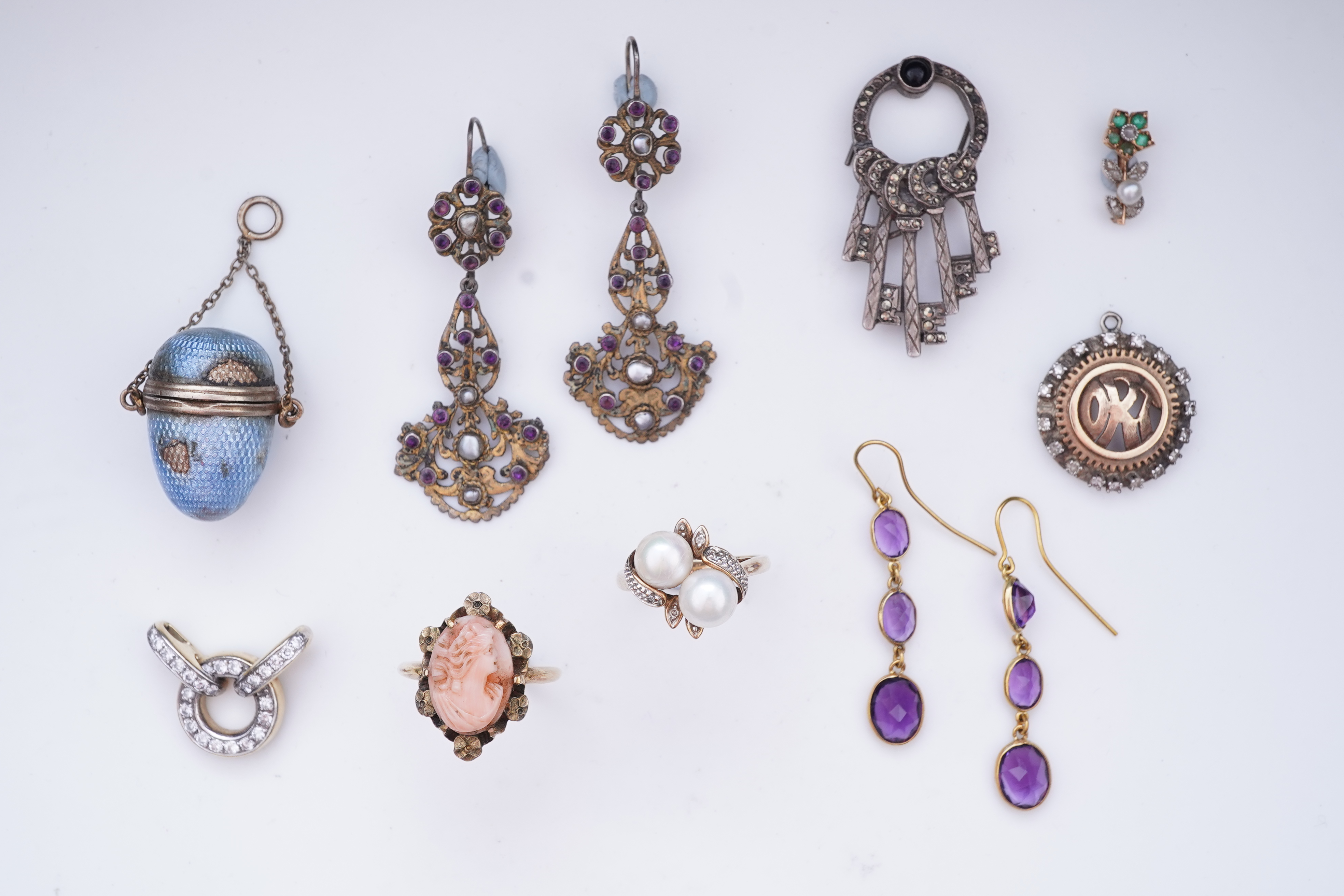 A rare set of amethyst and seed pearl buttons, circa 1900
